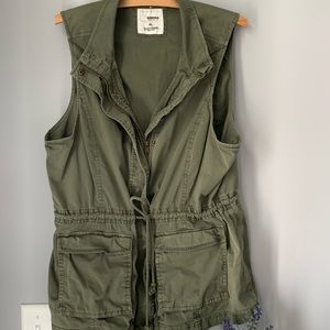 Gently worn olive green vest
